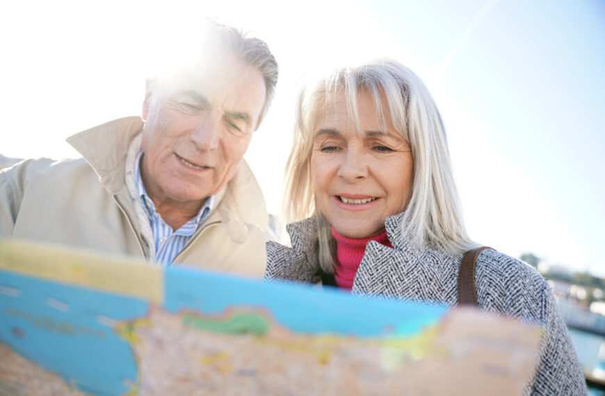 senior couple looking at a map